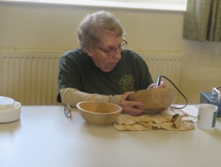 Patricia doing her thing with a pyrograph pen